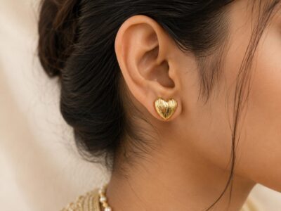 Leenzara Golden Heart Glow Stud Earrings - Image 2