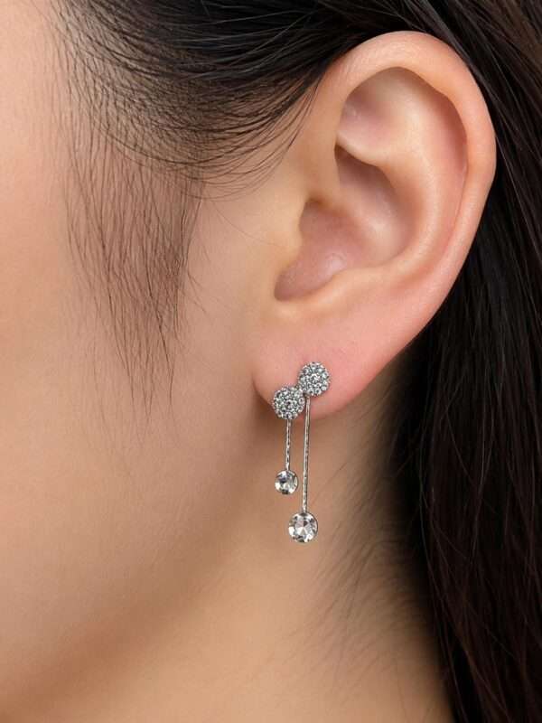 Leenzara Silver Bow Earrings - Image 2