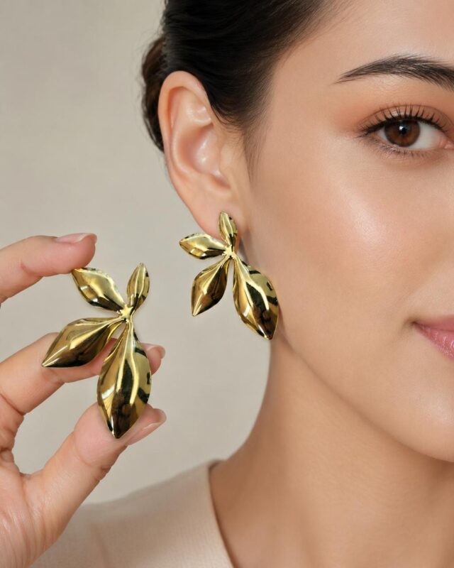 Leenzara Gold Leaf Statement Earrings - Image 3