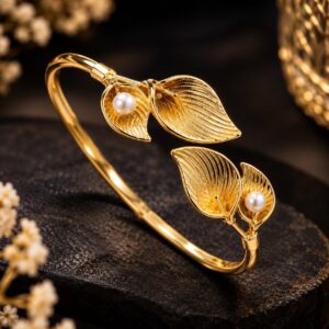 Gold Bracelet with Leaf-shaped design and crystal stones